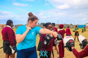 Representing UTS Global Charity at Exeter University